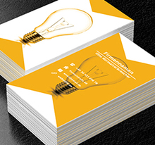 Glühlampe auf einem weißen und orange Hintergrund, Bauwesen, Beleuchtung - Visitenkarten Netprint